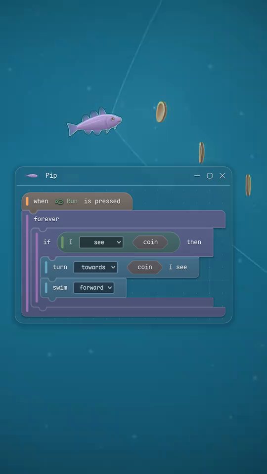 A fish follows its program towards a coin while the program is open beside it